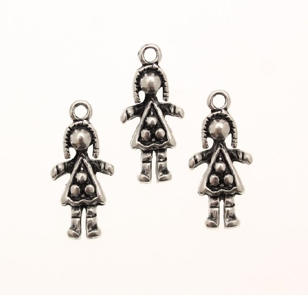 Ciondolo a forma di bambina con vestitino a pallini, 12x14 mm.