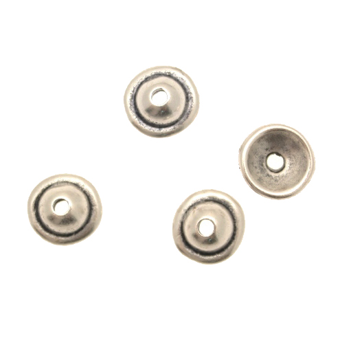 Coppetta tonda liscia con bordo sporgente, diametro 10 mm.