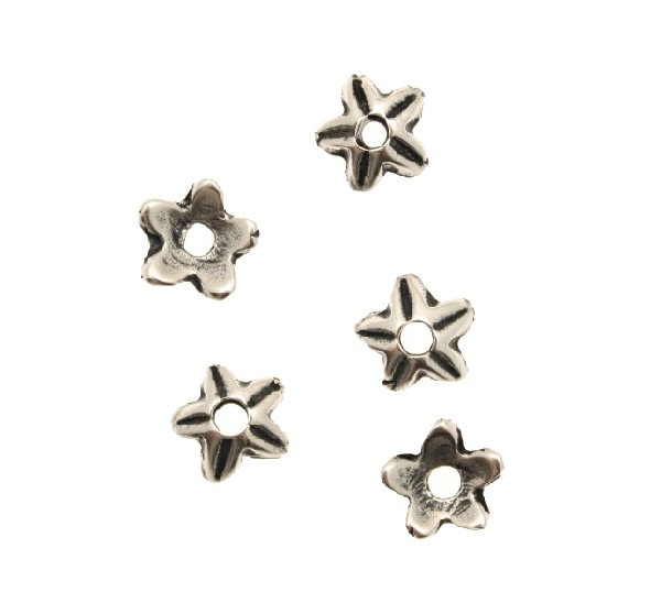 Coppetta tonda a forma di stella semplice a cinque punte con riga centrale, diametro 9 mm.
