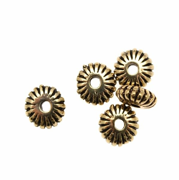 Distanziatore a rondella bombata e rigata, 10,4x3,8 mm.