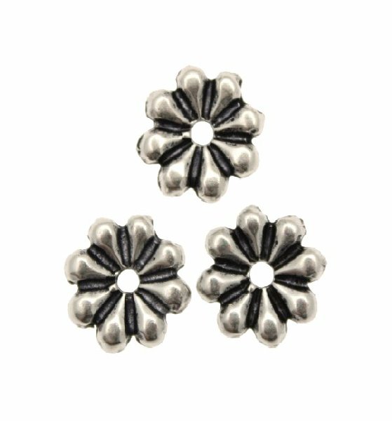 Distanziatore a rondella a spicchi, 12,4x2,9 mm. (dimensione foro interno 2 mm.)