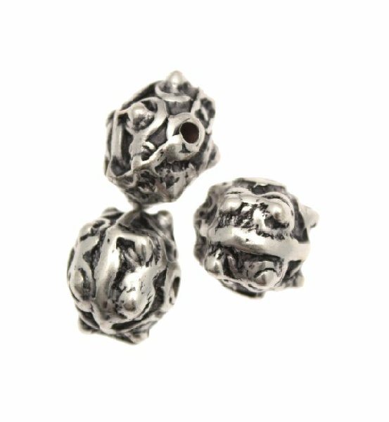 Distanziatore a palla disegnata con riga centrale liscia e sei pallini sporgenti per lato, 12x12 mm.