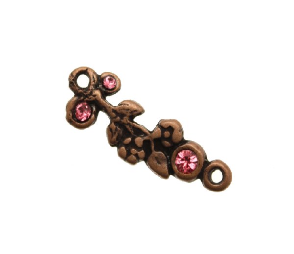 Ciondolo smaltato a forma di ramo di fiori con 3 strass e con 2 anelli 30x10 mm. Base rame antico