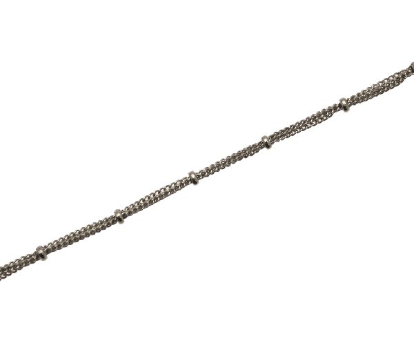 Catena composta da tre catene grumette sottilissime fermate ogni 15 mm. da una rondellina liscia