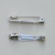 Spilla da incollo o da cucito a barra con 2 fori 25 mm. Base Argentato Rodio