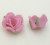 Rosa in pasta di fimo colorata, piatta sotto con foro passante, larga 18 mm., alta 11 mm., colore Rosa