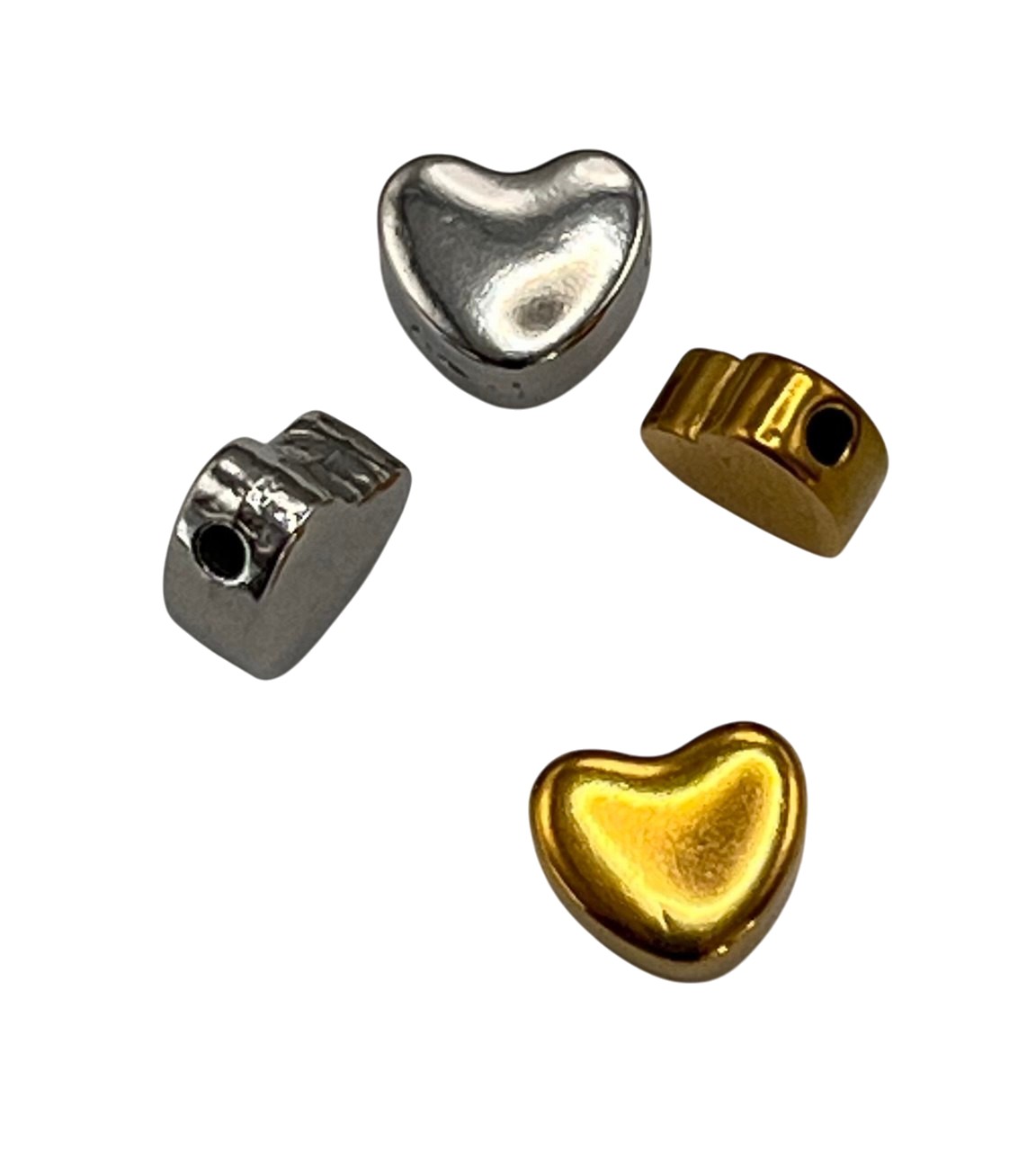 Distanziatore a forma di Cuore leggermente bombato, in Acciaio, misura 9x8x1,4 mm.