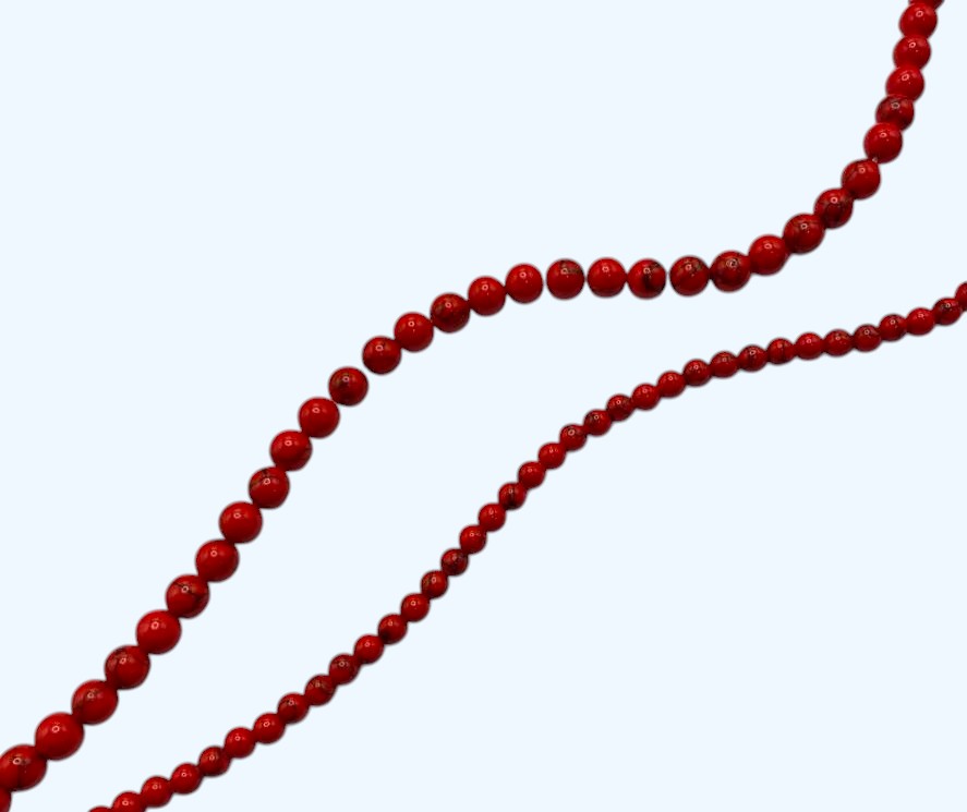Filo di pietre dure tonde, HOWLITE ROSSA