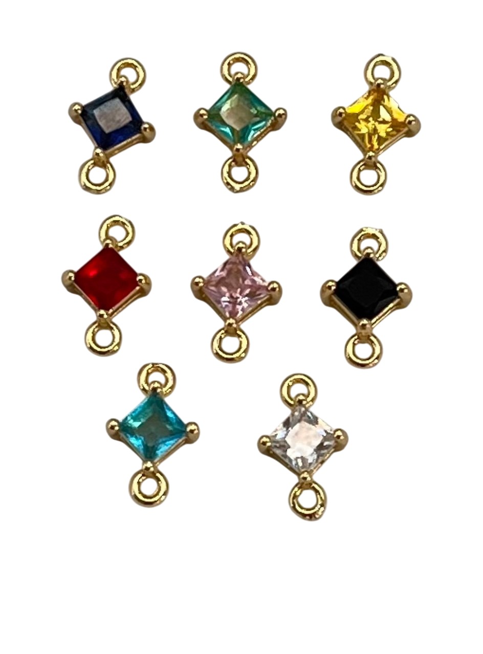 Elemento a due anelli, 6x11mm., composto da castone e gemma quadrata con anelli chiusi